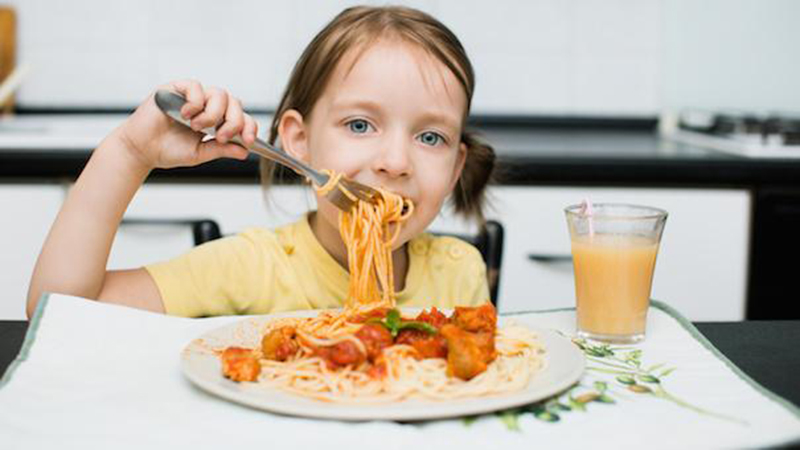 Limit your child's eating sour and fatty foods at this meal because it may cause bloating, indigestion and poor sleep.