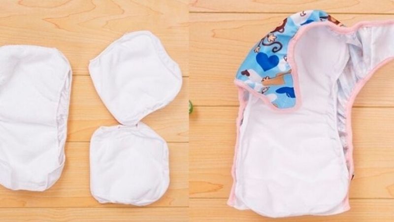 Remove the sticker on the outside of the pad and stick it directly on the cloth diaper